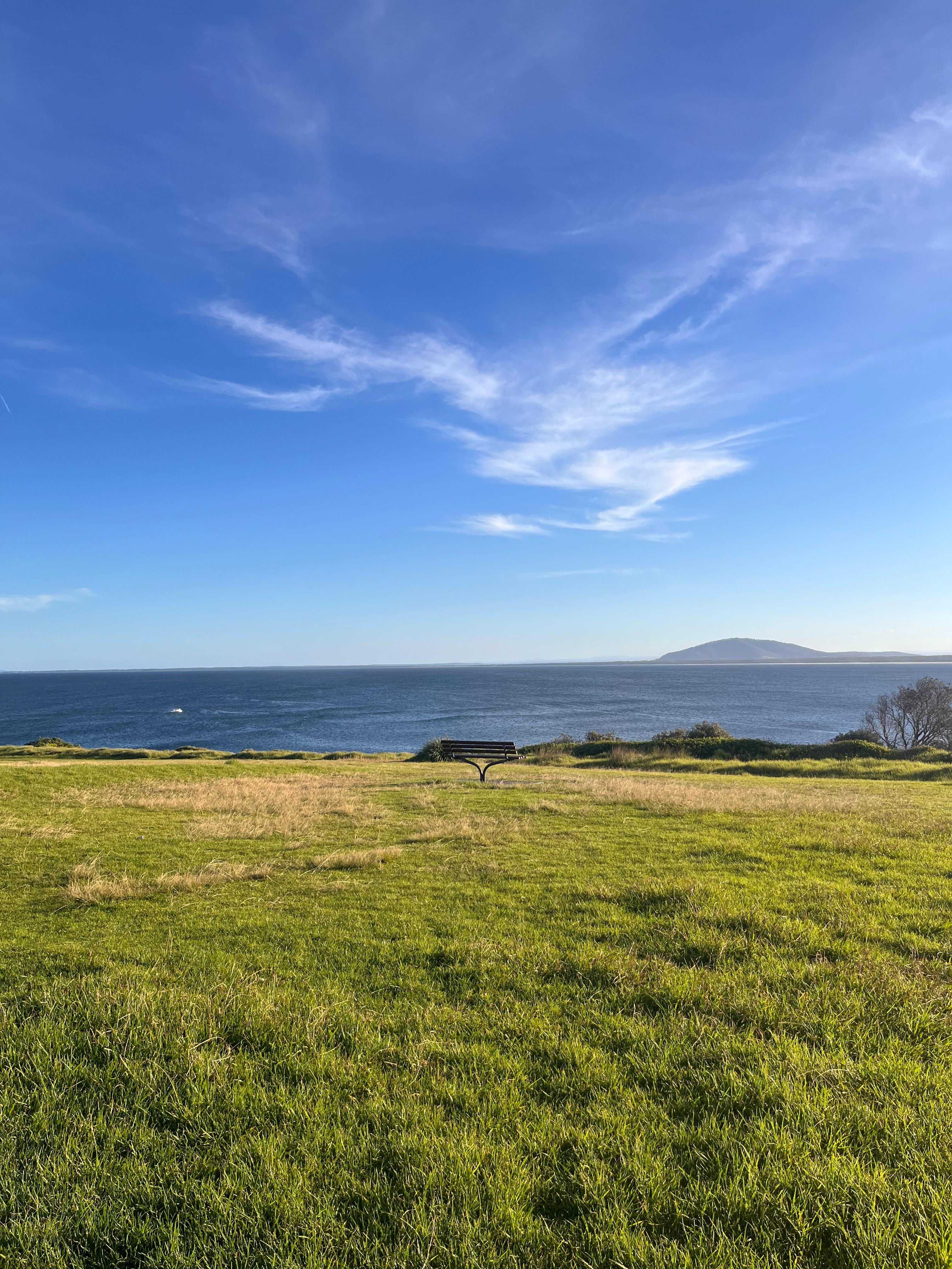 A coastal path leading towards the lighthouse